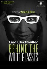 Behind the White Glasses