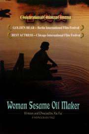 Woman Sesame Oil Maker